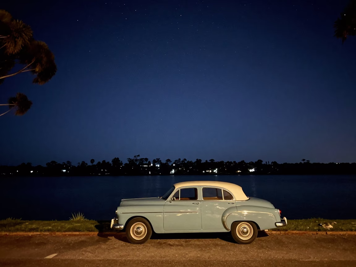 1950s Perth Night Sky Over Swan River with Vintage Car and Streetlamp Glow in in Perth, Western Australia, Australia