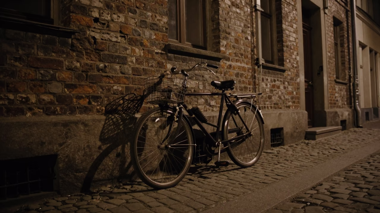 1960s Berlin Night Street Scene with Bicycle and Cobblestone Alley in in Berlin, Germany