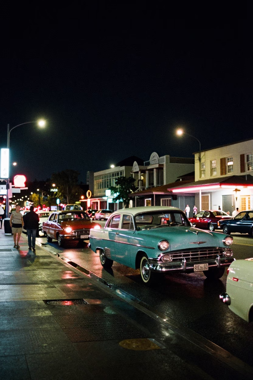 1960s Perth Night Street Scene with Vintage Cars and Neon Signs in in Perth, Western Australia, Australia