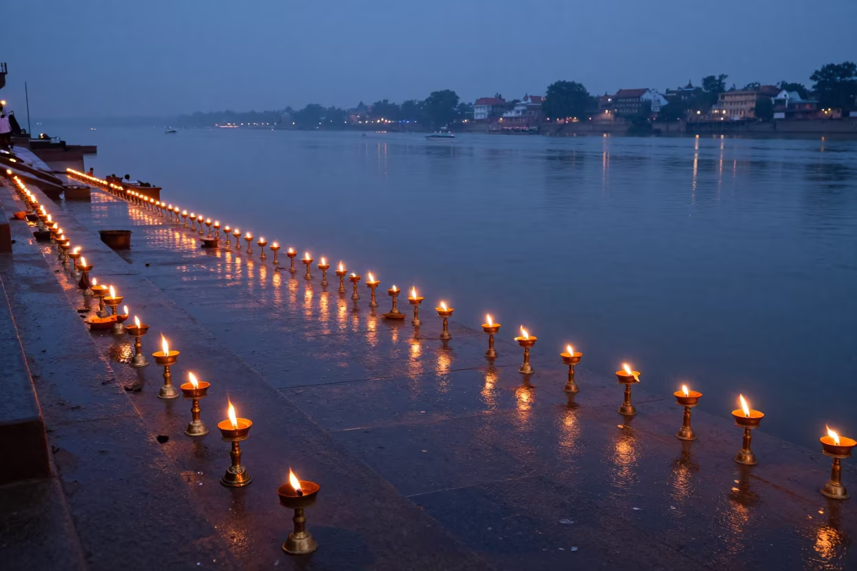 Aarti Lamps Reflected in Ganges Twilight Drizzle in at a shrine entrance in India