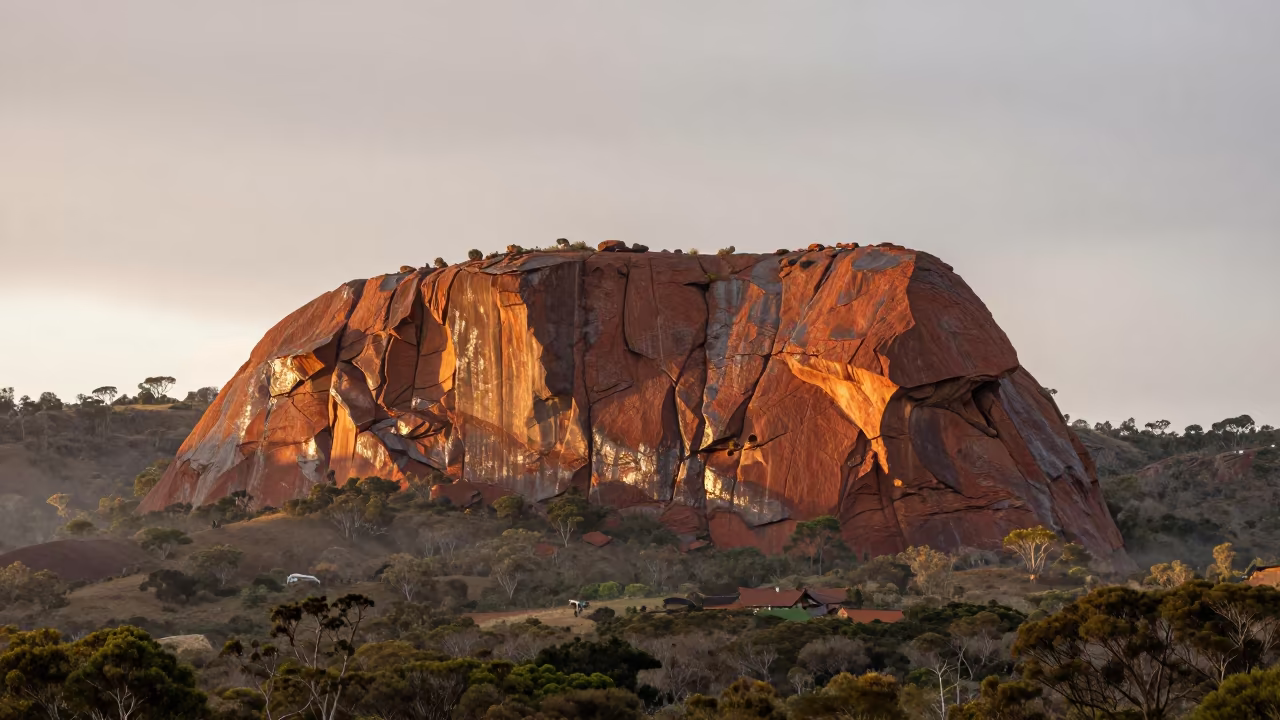 Aboriginal Sacred Rock at Sunset Over Sydney Foothills in from a ridge above layered foothills near Sydney