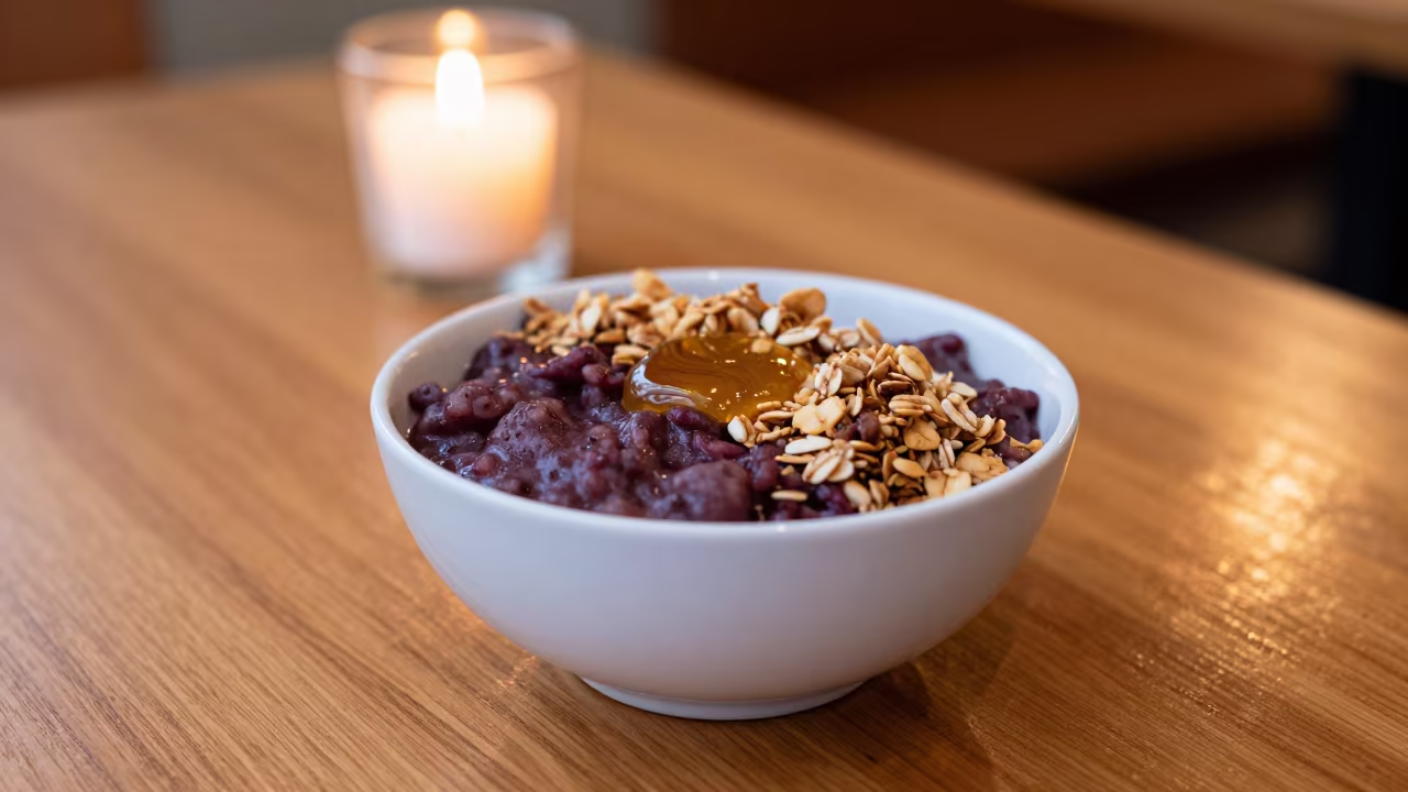 Açaí Bowl with Honey and Granola at Diner in at a roadside diner table in Gujranwala