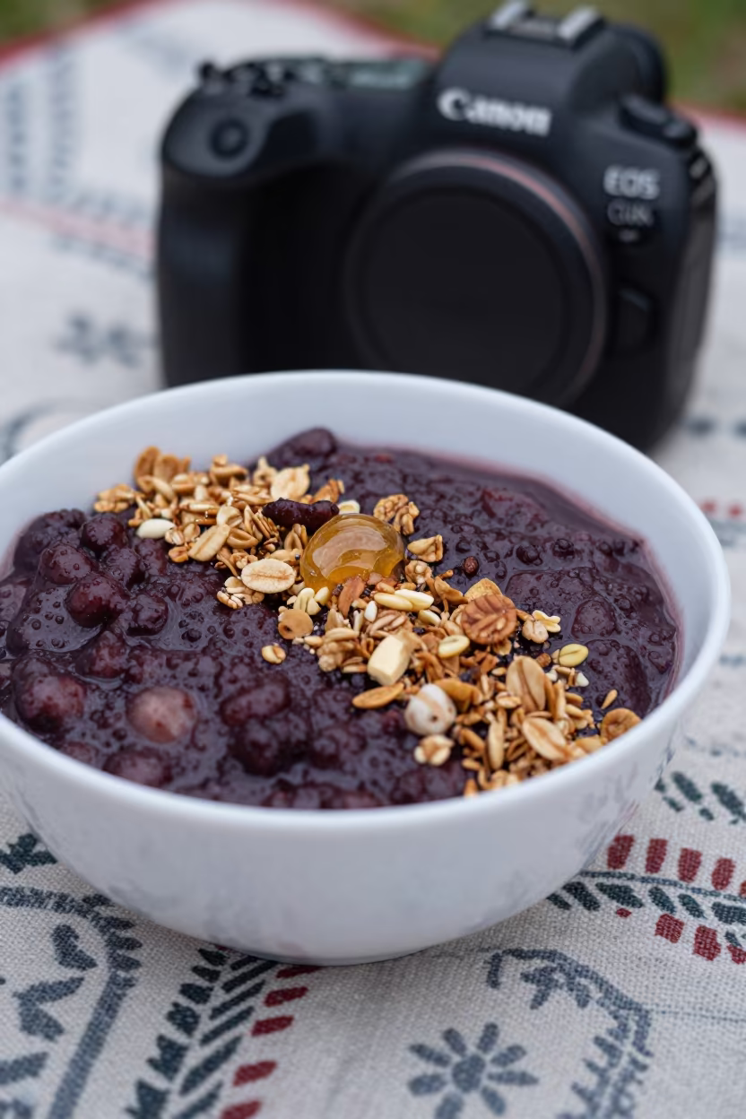 Açaí Bowl with Granola and Honey on Picnic Blanket in on a picnic blanket in Ipoh