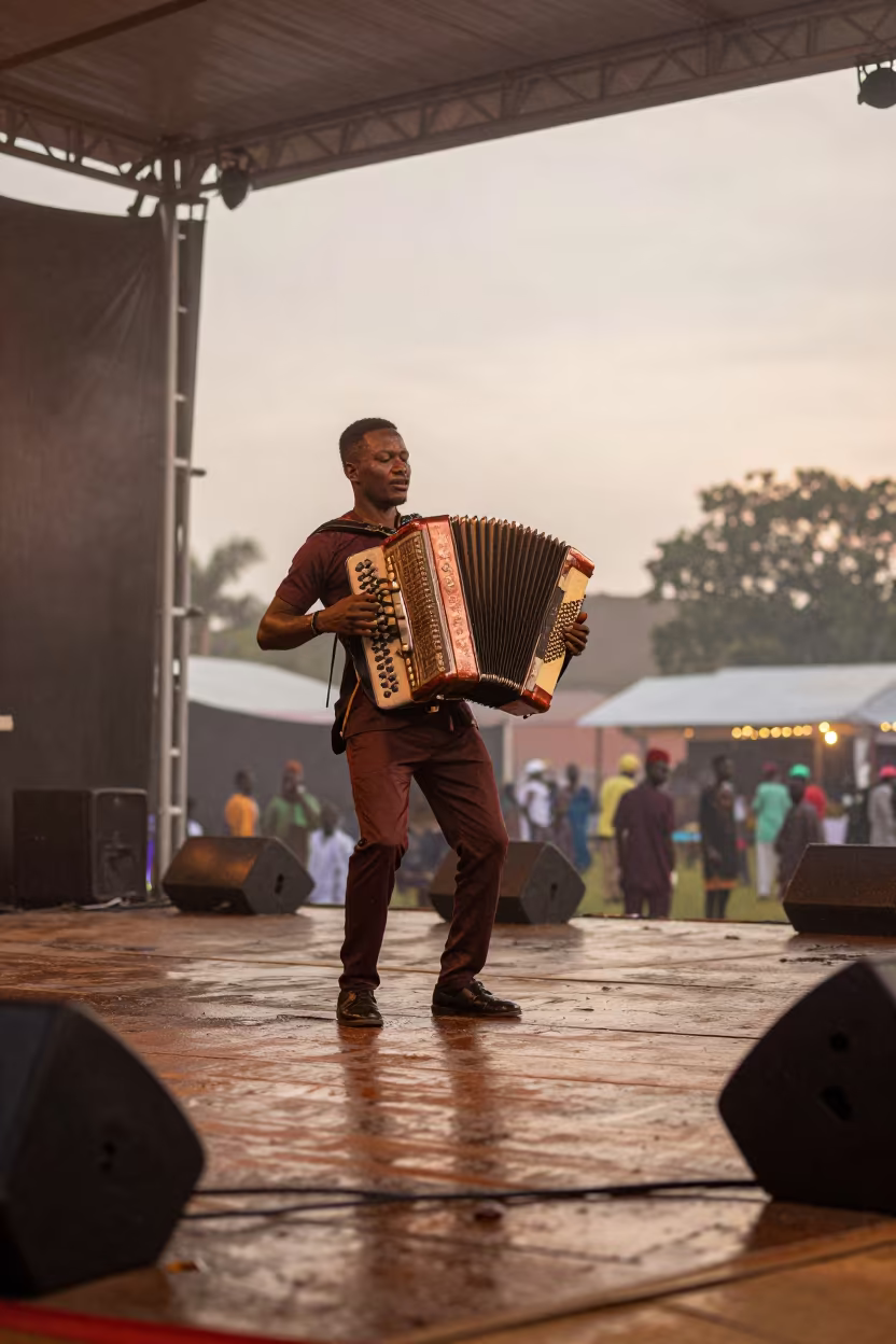 Accordion Busker on Festival Stage in Ogbomosho in on a festival main stage in Ogbomosho