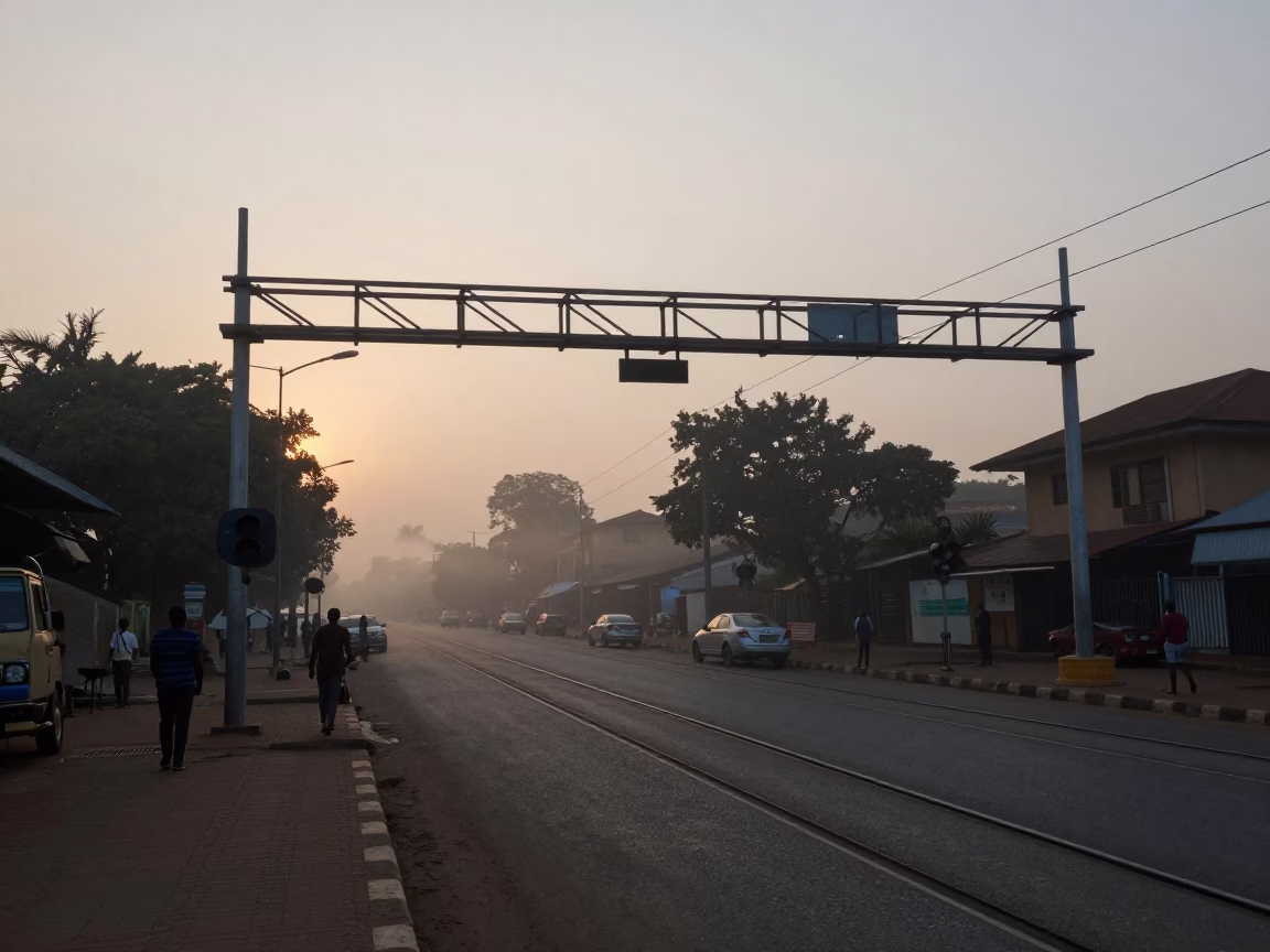 Accra Ghana Pre-Dawn Street Scene with Signal Gantry and Morning Mist in in Accra, Ghana