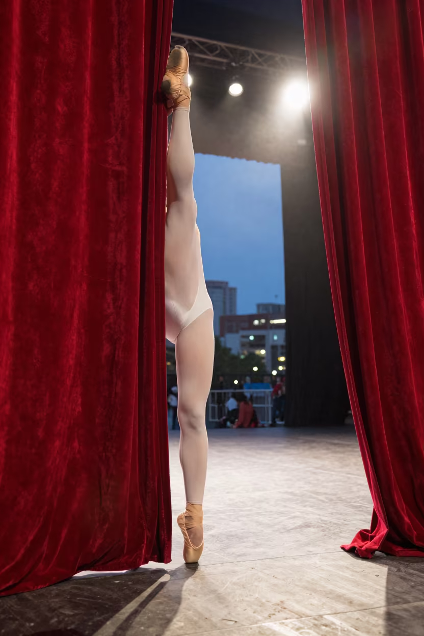 Acrobat Stretching Behind Circus Tent Curtain Barinas in on a festival main stage in Barinas