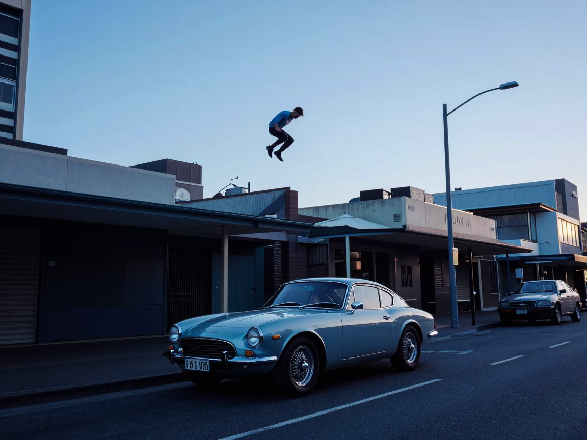 Adelaide Nautical Dawn Street Scene with Vintage Sports Car and Parkour Ledge Jump in in Adelaide, South Australia, Australia