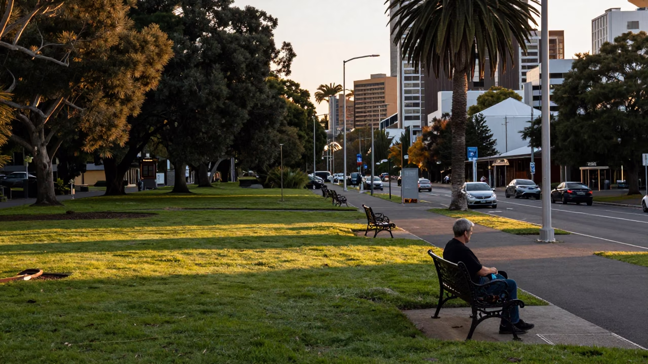 Adelaide Parklands Evening Light with Local Street Scene and Newspaper Stack in in Adelaide, South Australia, Australia