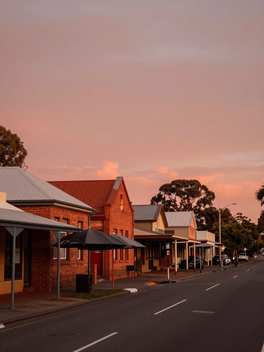 Adelaide South Australia copper-toned dusk street scene with umbrellas and local architecture in in Adelaide, South Australia, Australia