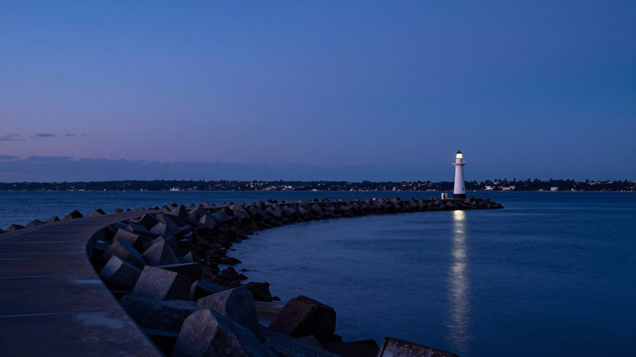 Adelaide South Australia Indigo Twilight Breakwater Curve Harbor Beacon and Coastal Scene in in Adelaide, South Australia, Australia