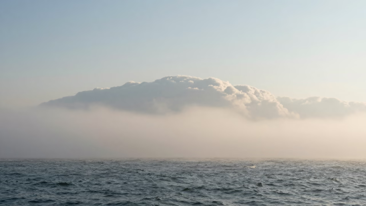 Advection Fog Rolling Over Venice Ocean Horizon in over a horizon of stacked thunderheads near Dorsoduro, Venice