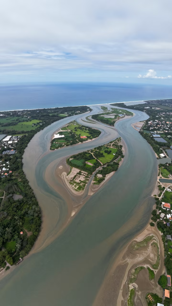 Aerial Braided Delta Meets Open Sea Philippines in far above river meanders in Philippines