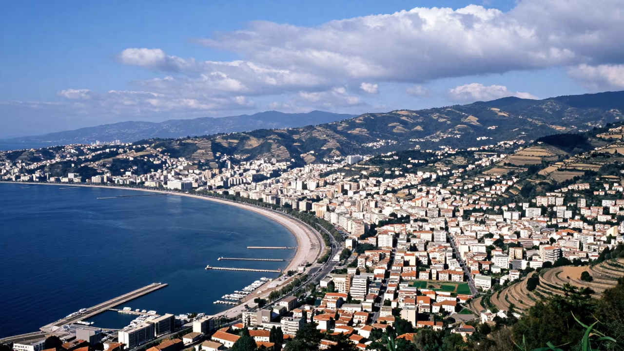 Aerial Coastal City Curved Bay Docks Midsummer Storm Clearing in far above terraced hillsides near Xian