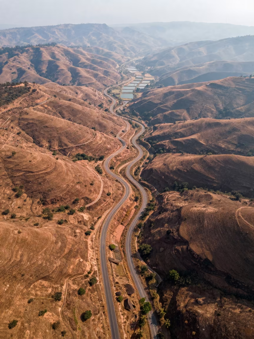 Aerial View of Copper Hills and Switchback Roads in high above irrigation geometry in Odisha