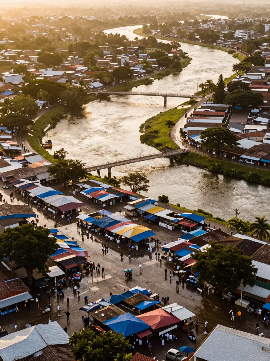 Aerial Market Square with Colorful Awnings in high above braided river channels near Barquisimeto