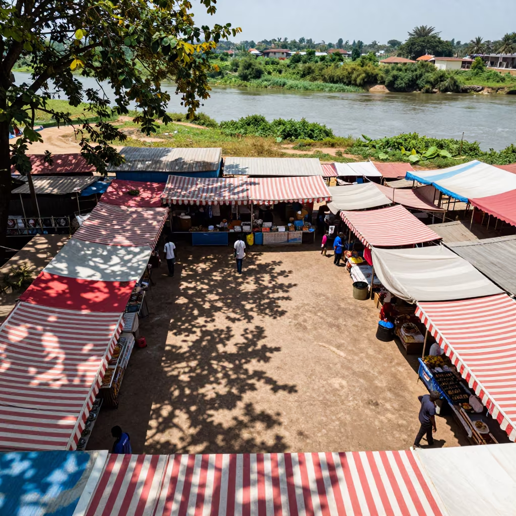 Aerial Market Square Under Striped Awnings Near River in far above river meanders near Obninsk