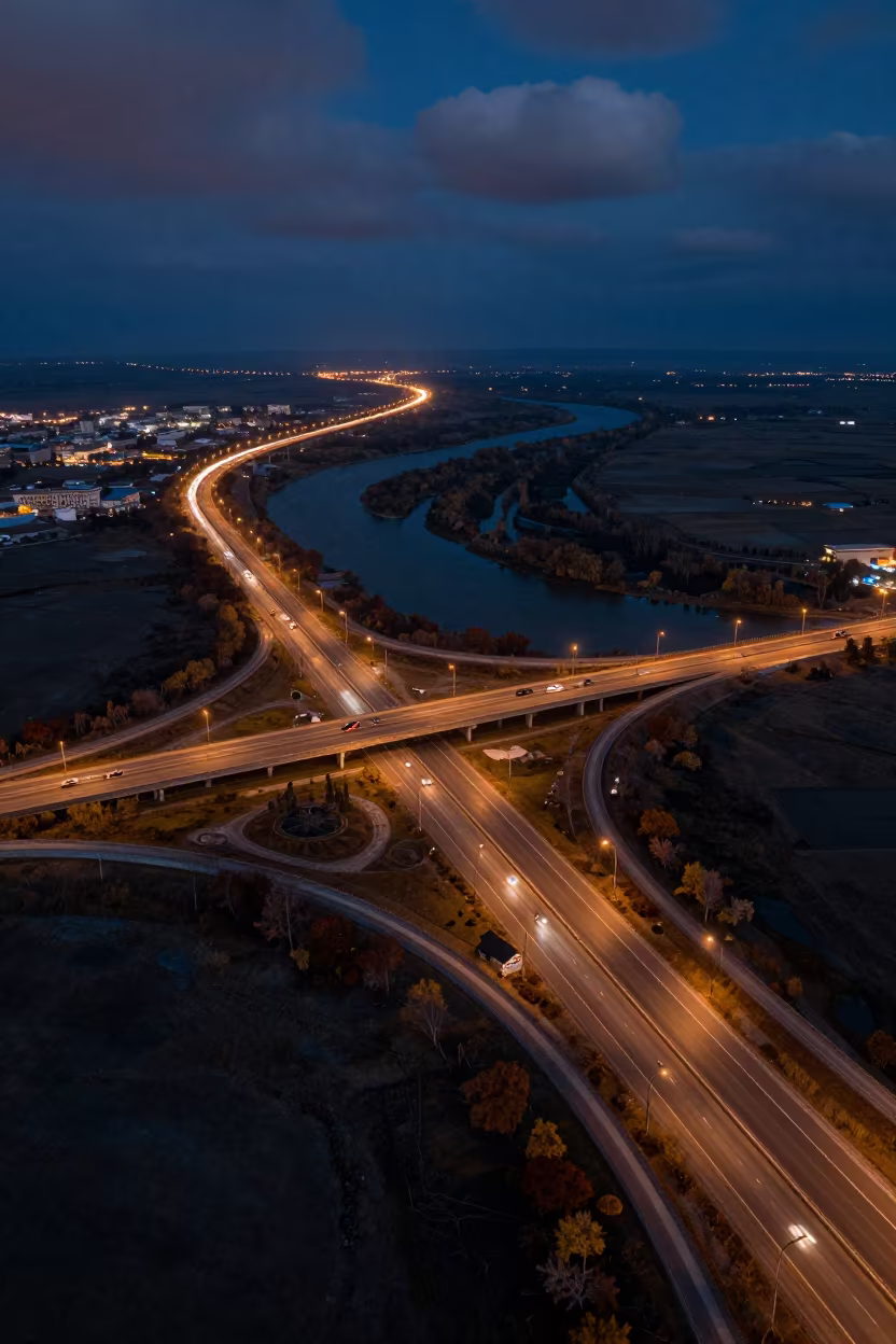 Aerial Night View Uzbekistan Highway Interchange in high above braided river channels in Uzbekistan