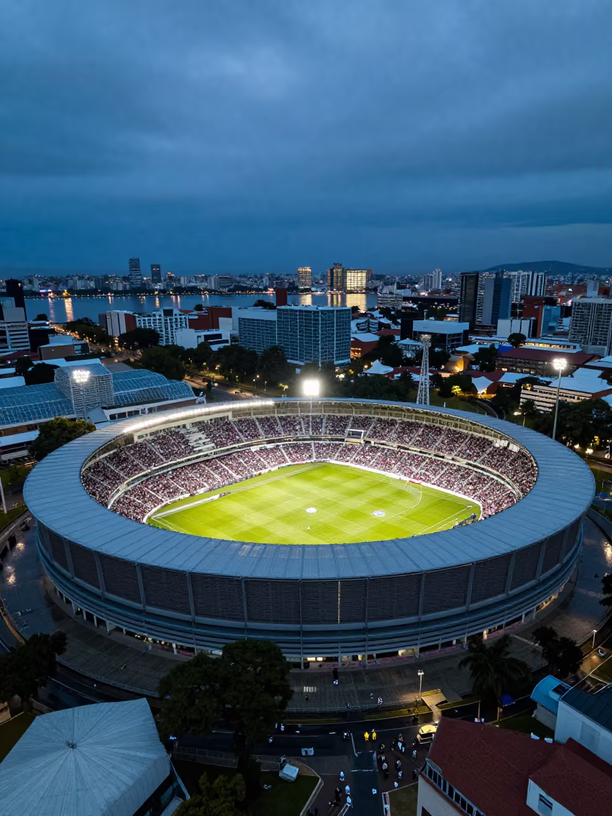 Aerial View of Stadium Spectators Blue Hour in high over greenhouse grids near Montevideo