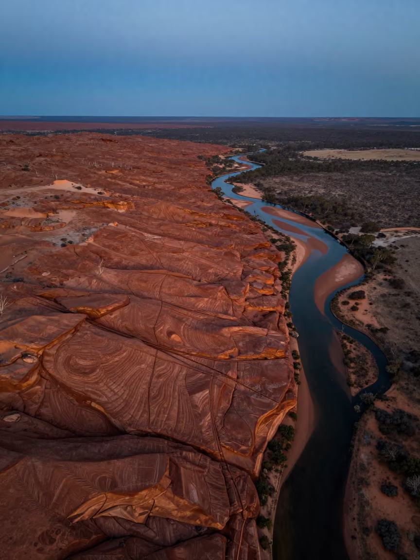Aerial View of Petrified Dunes at Blue Hour in high above braided river channels in Australia