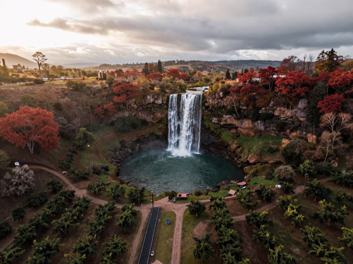 Aerial View of Waterfall and Autumn Pool Near La Paz in far above orchard blocks and irrigation lines near La Paz