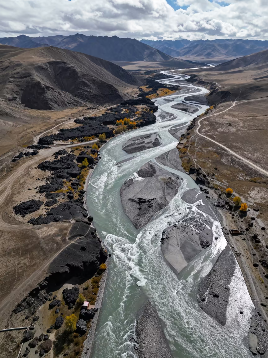 Aerial View of Volcanic Beach Near Lhasa in high above braided river channels near Lhasa