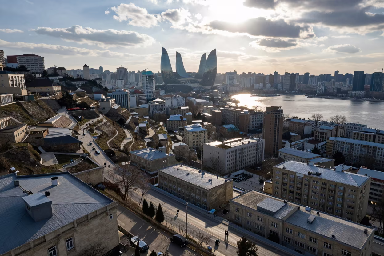 Aerial Winter Rooftops Baku Late Afternoon Sun in far above terraced hillsides near Baku