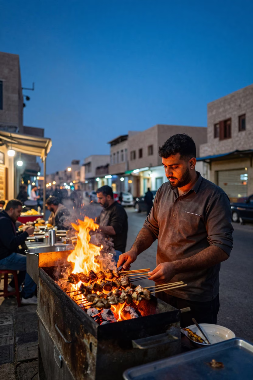 Alexandria Egypt Blue Hour Street Scene with Kebab Grill and Local Dining in in Alexandria, Egypt