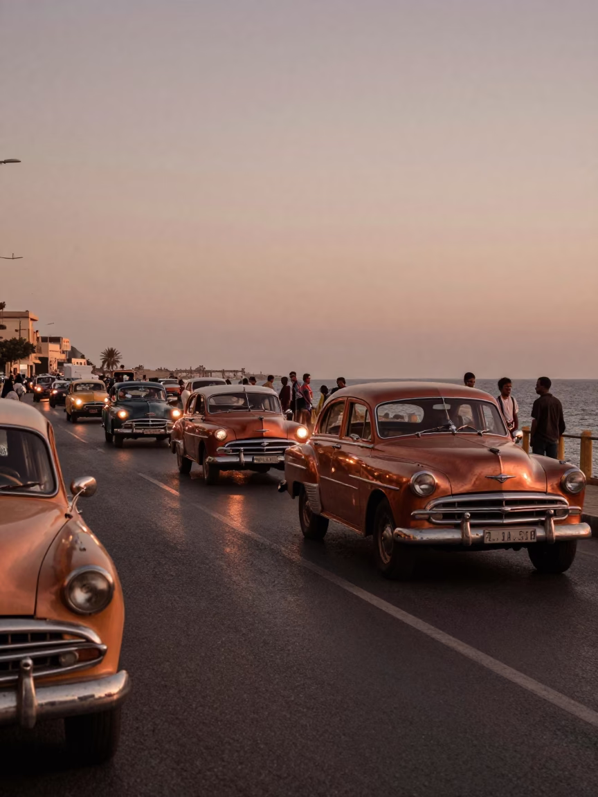 Alexandria Egypt Dusk Street Scene with Vintage Car Rally and Traditional Dolma in in Alexandria, Egypt