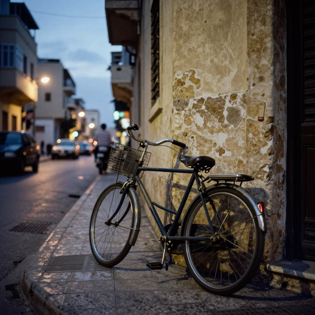 Alexandria Egypt street scene at dusk with vintage bicycle and coffee cupper in in Alexandria, Egypt