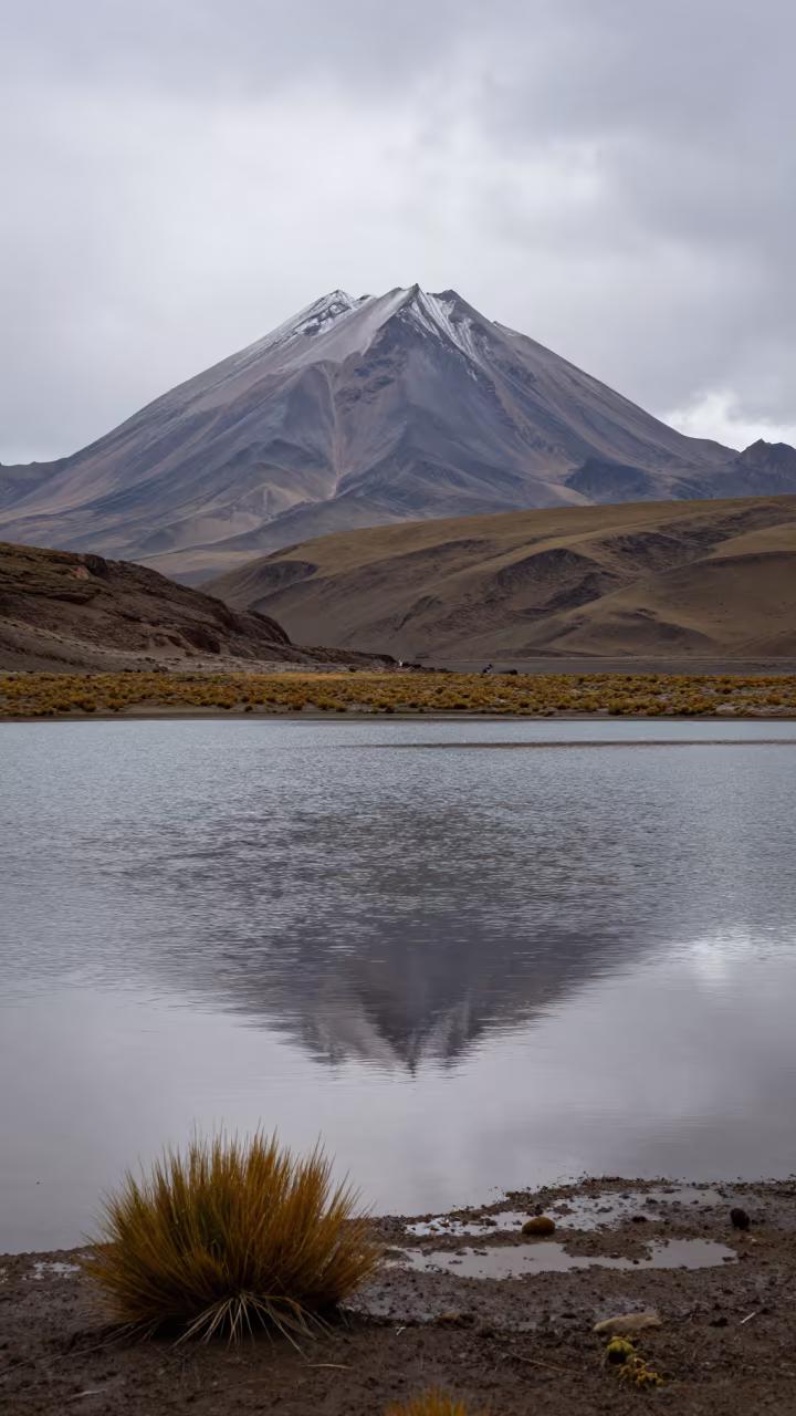 Alpine Lake Reflecting Peak After Rain Bolivia in across a floodplain after rain in Bolivia