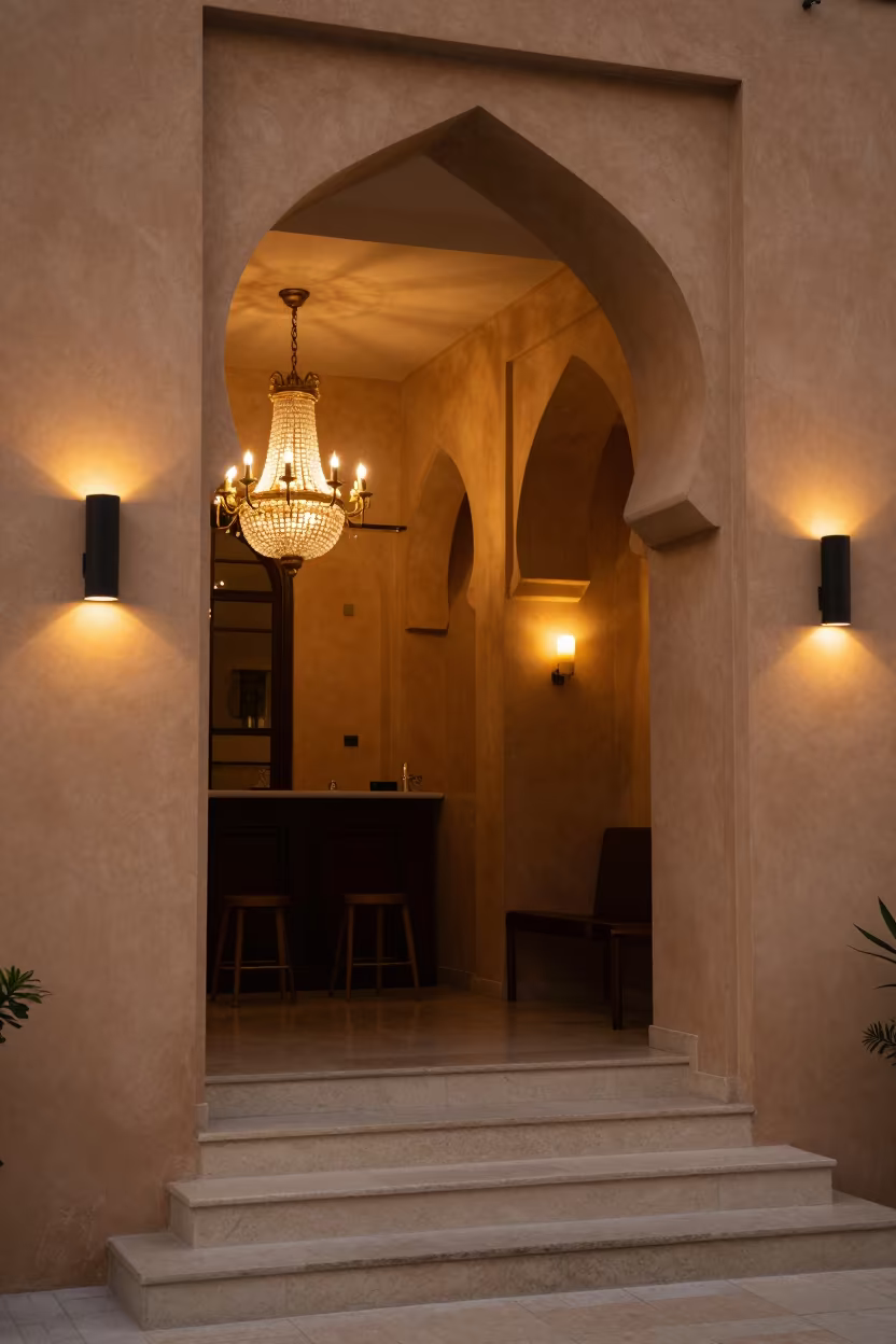 Amber Sconce Lit Hotel Stair Landing Near Basra in inside a chandelier-lit hotel stairwell near Basra