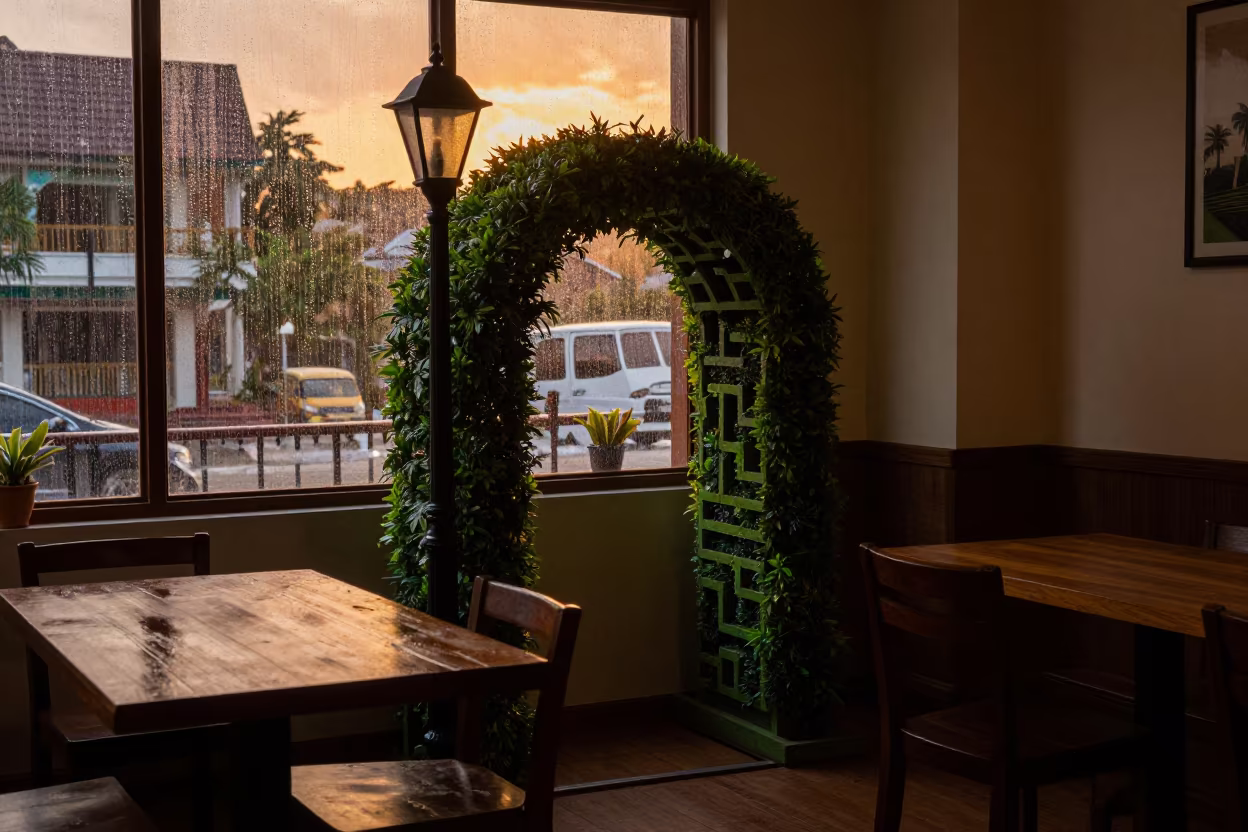 Amber Sunset Light on Topiary Maze Model in on a cafe table by a window in Mawlamyine