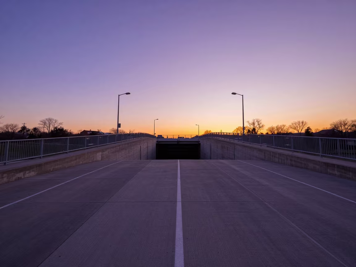 Amber Sunset Over Violet Sky on Rhode Island Overpass in at a canal lock chamber in Rhode Island