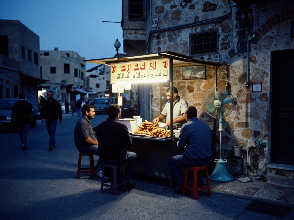 Amman Jordan Blue Hour Street Scene with Table Fan and Accra Fritters in in Amman, Jordan