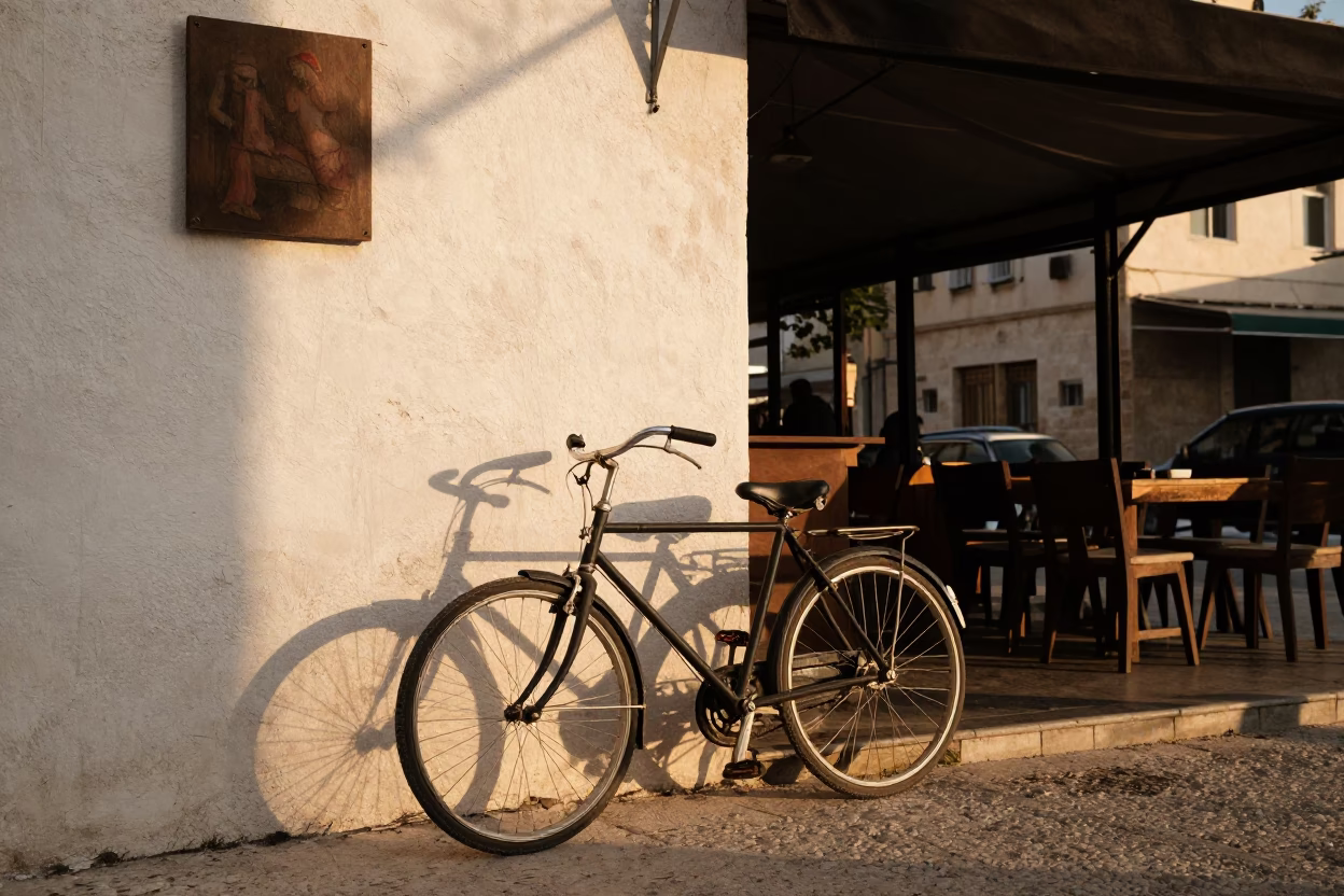 Amman Jordan Evening Street Scene with Bicycle Leaning Against Cafe and Hydrangea Bush in in Amman, Jordan