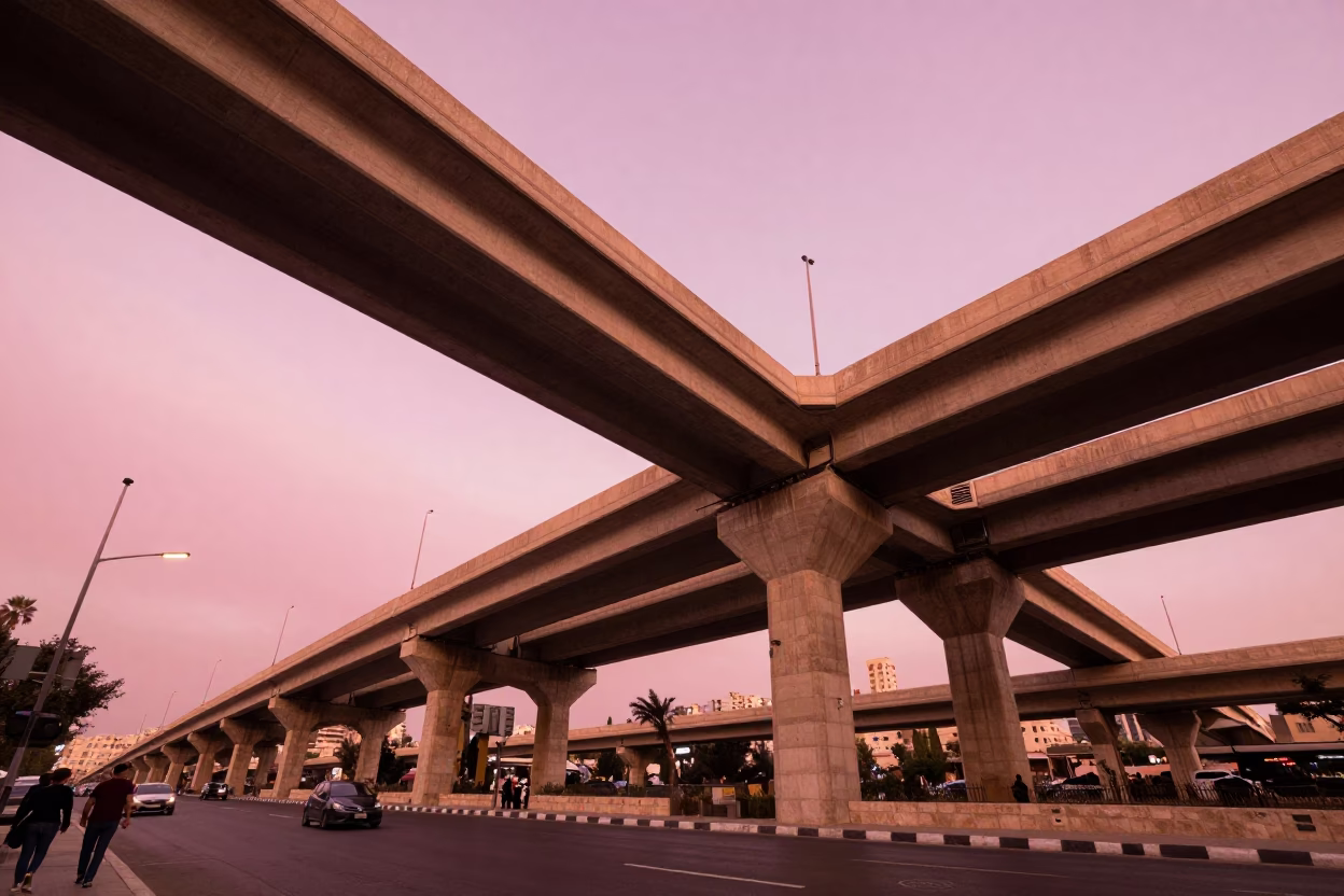 Amman Jordan Highway Flyover Stack Against Pink Evening Sky Before Dusk in in Amman, Jordan