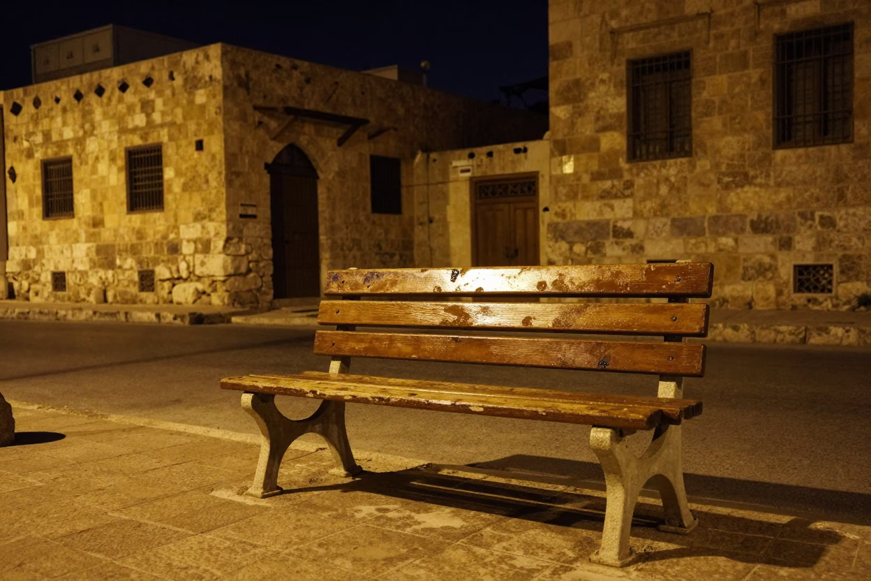 Amman Jordan Night Street Scene with Grease Sheen on Bench Slat and Urban Architecture in in Amman, Jordan