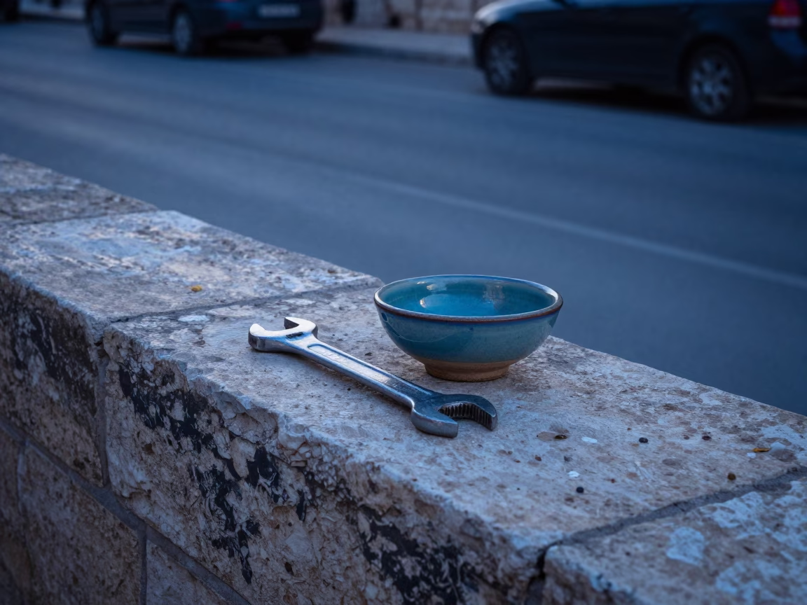 Amman Jordan Pre-Dawn Street Scene with Wrench and Glazed Ceramic on Ledge in in Amman, Jordan