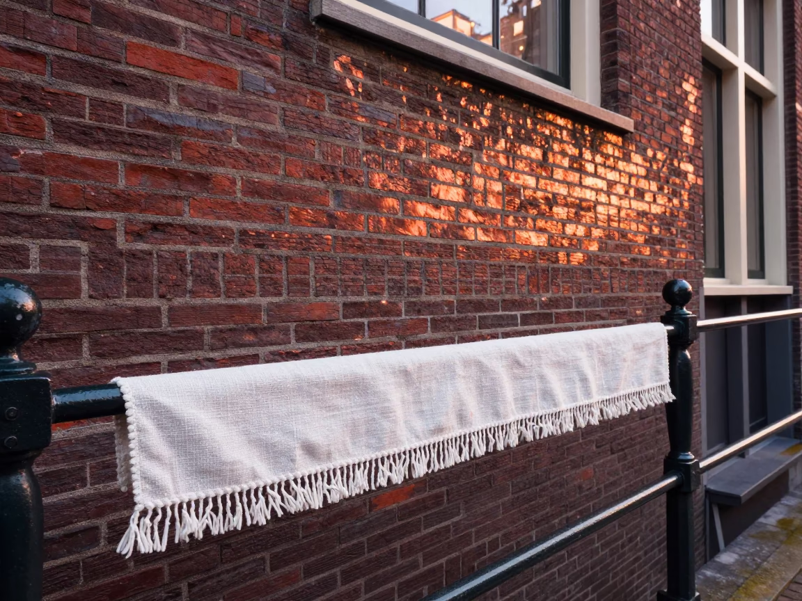 Amsterdam Canal House Brickwork and Linen Fringe in Copper Dusk Light in in Amsterdam, Netherlands