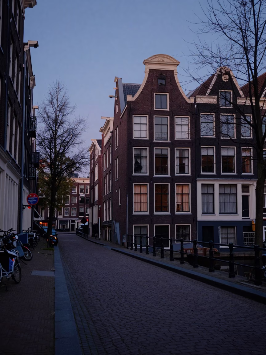 Amsterdam Canal House Facade and Cobblestone Street at Pre-Dawn in 1980s Netherlands in in Amsterdam, Netherlands