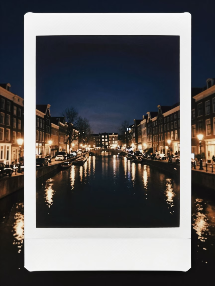 Amsterdam Canal Night Street Scene with Reflections and Historic Architecture in in Amsterdam, Netherlands