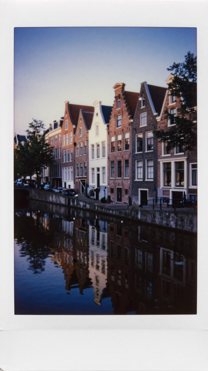 Amsterdam Canal Reflections at The Predawn Darkness Light in in Amsterdam, Netherlands