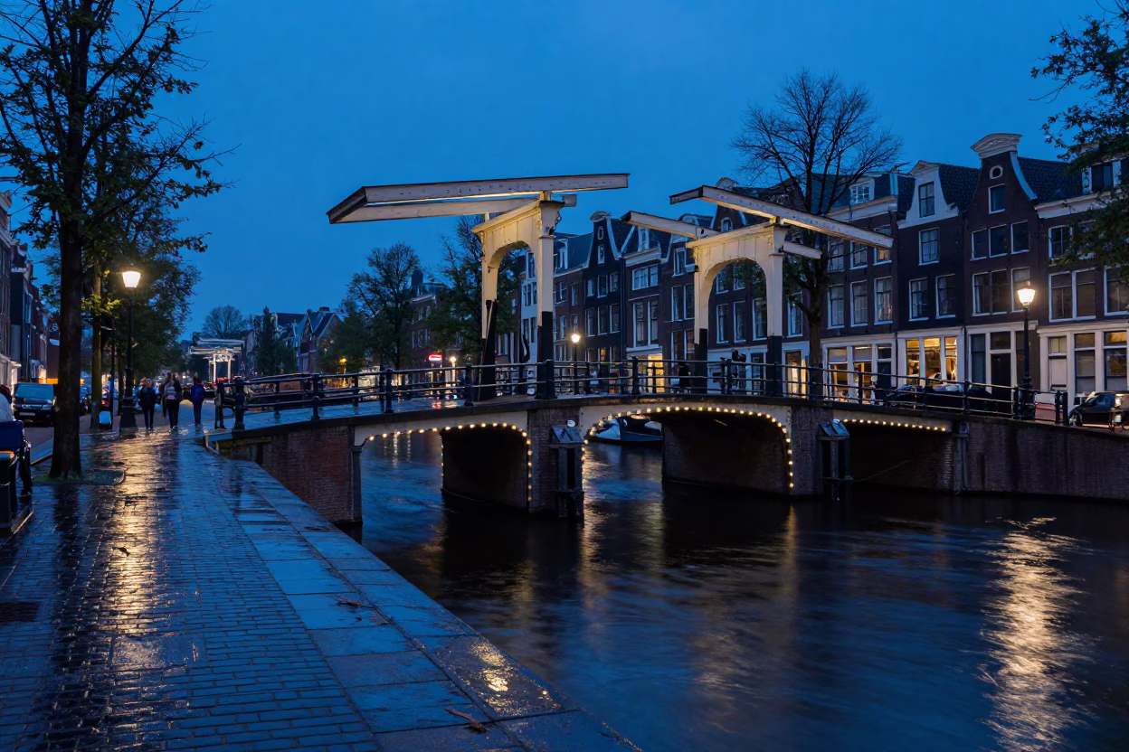 Amsterdam Drawbridge Twilight Canal Wet Flagstones and Iron Hook in in Amsterdam, Netherlands