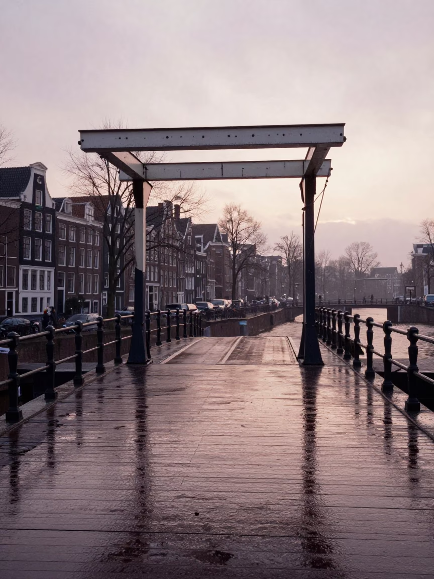 Amsterdam Early Morning Drawbridge Deck Wet With Rain And River Light Reflections in in Amsterdam, Netherlands