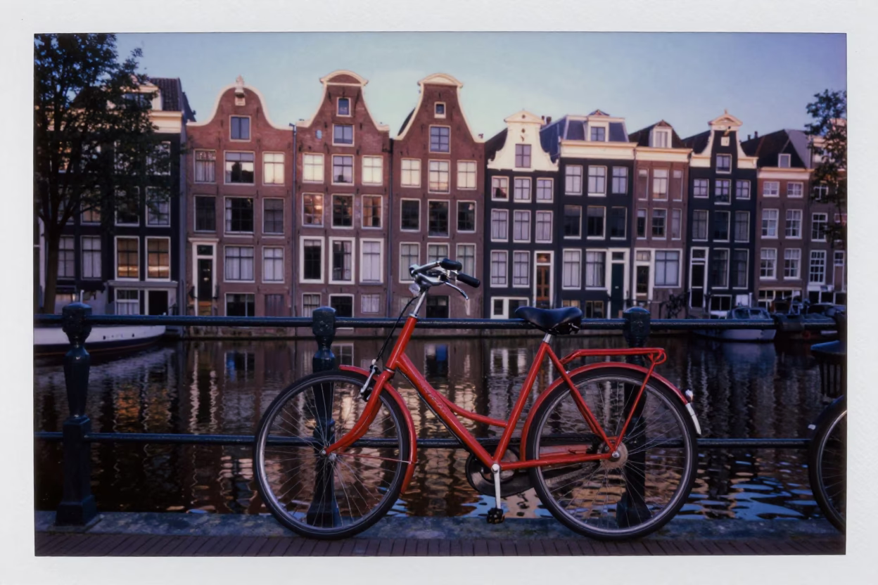 Amsterdam Nautical Dawn Canal Scene with Bicycle and Water Reflections in in Amsterdam, Netherlands