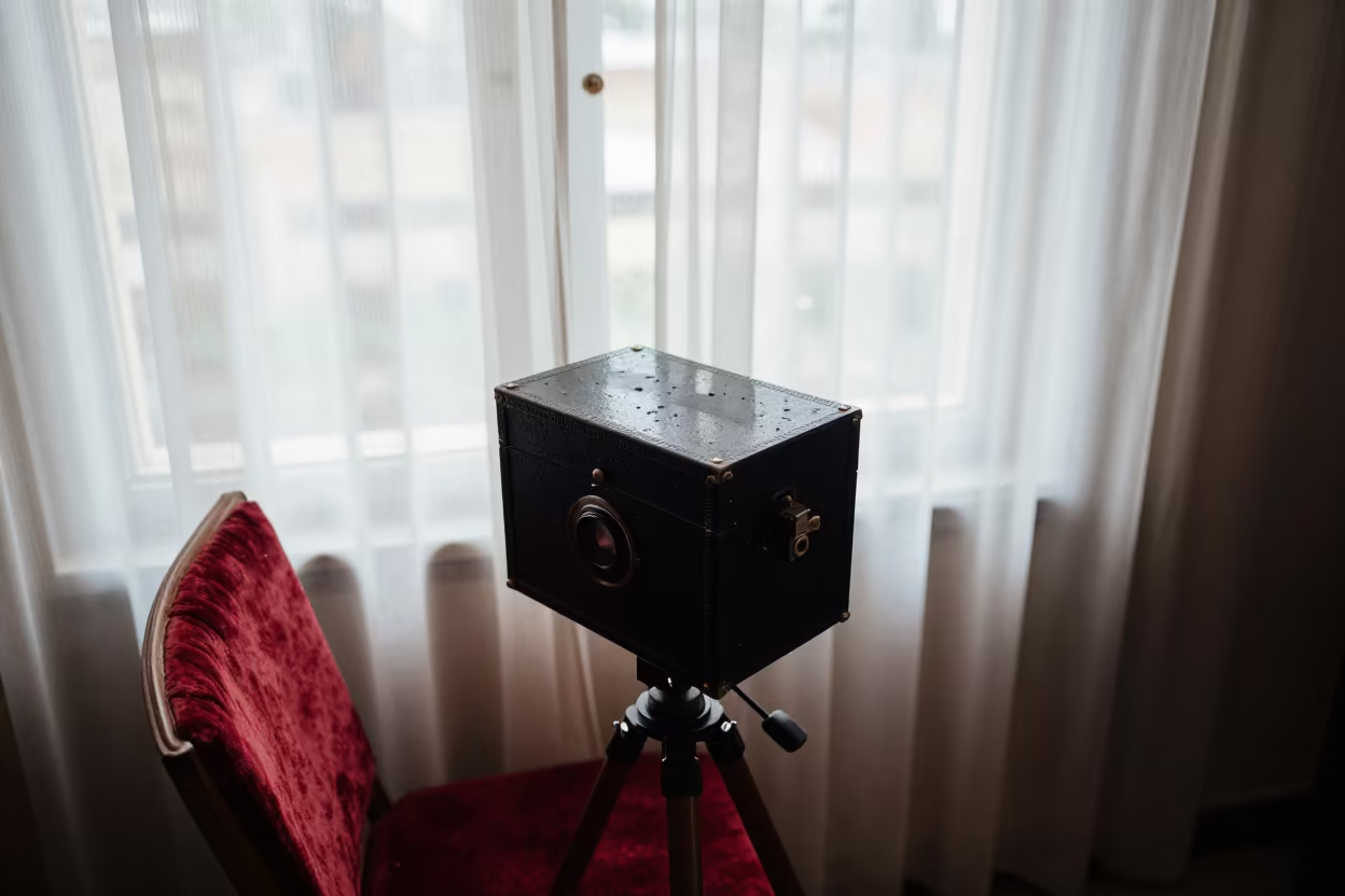 Antique Camera Obscura on Velvet Chair Near Shiraz Window in on a velvet chair near Shiraz