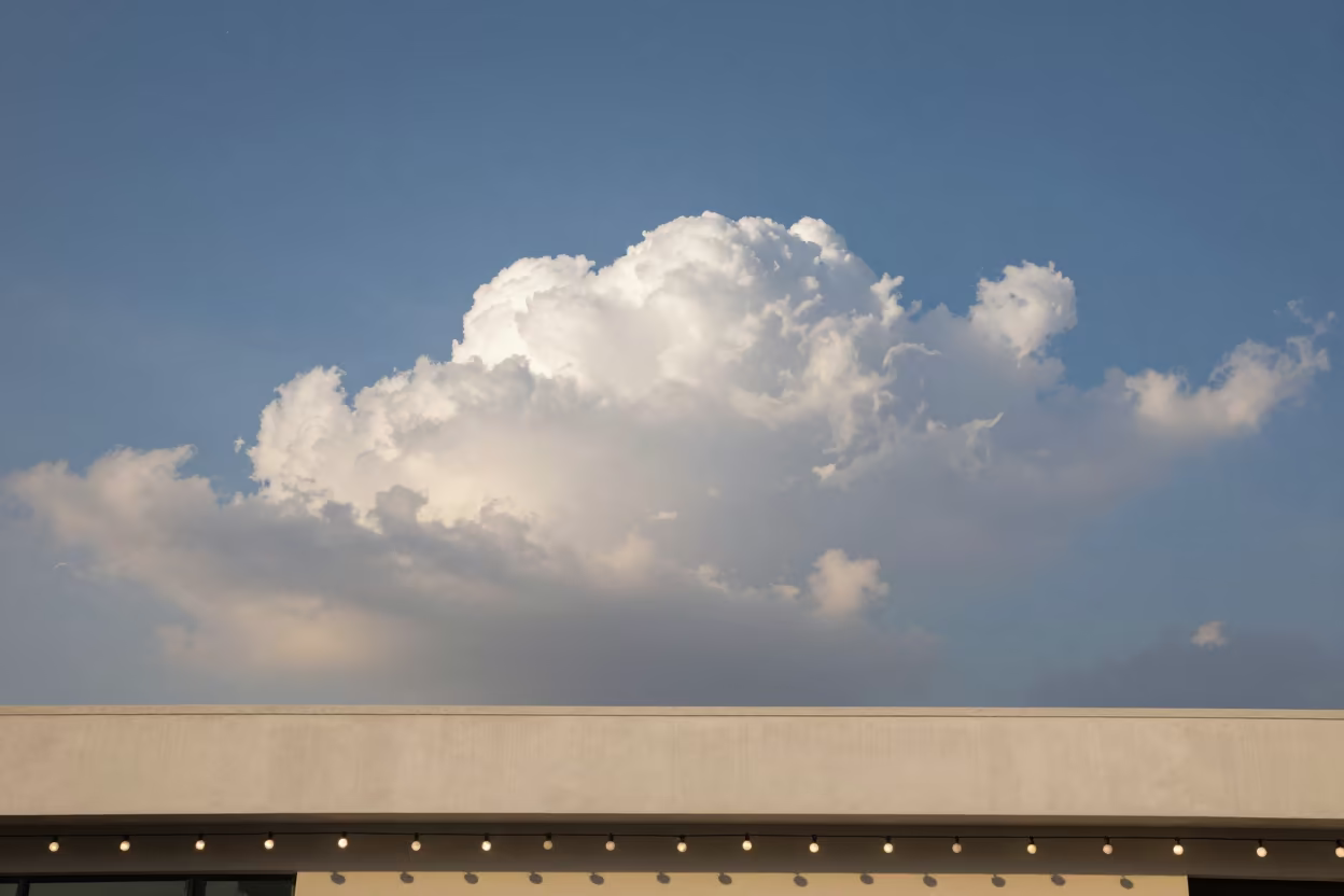 Anvil Cloud Display on Beijing Ledge Under Daylight Sky in on a painted display ledge in Wangfujing, Beijing