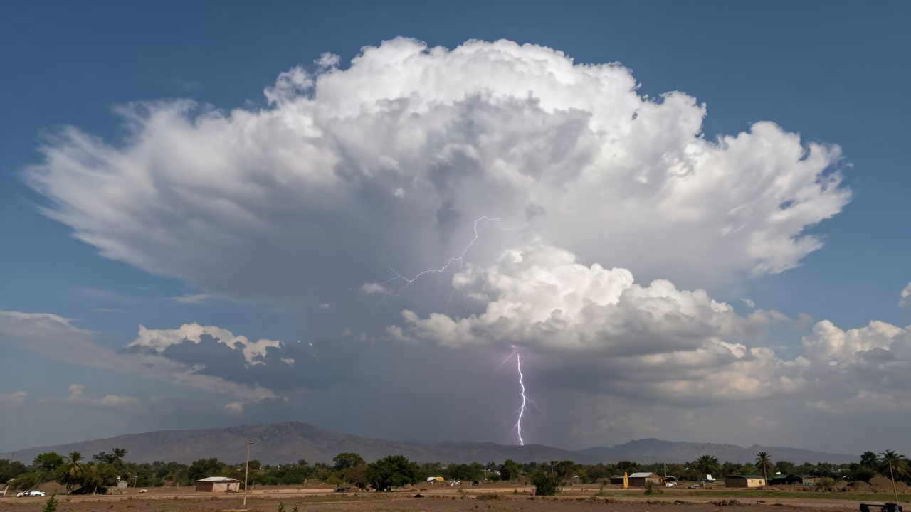 Anvil Cloud Lightning Over Jamnagar Thunderheads in over a horizon of stacked thunderheads near Jamnagar