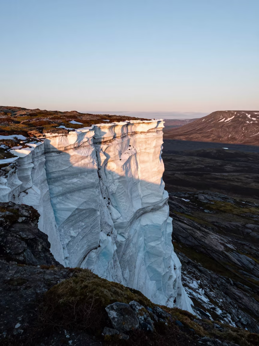 Arctic Permafrost Cliff Ice Wedges Twilight in across a wide valley floor in Lapland