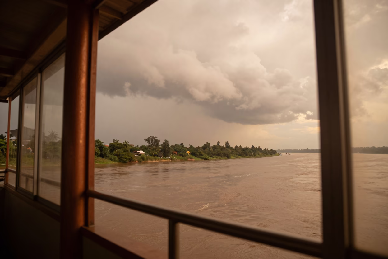 Arcus Cloud Line Over Kisangani Pier in on a pier railing near Kisangani